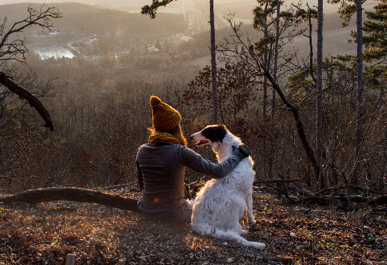 Girl Sitting with Dog